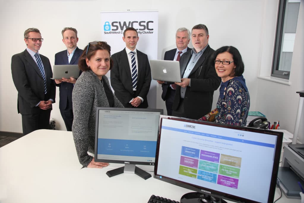 PIC: MARK PASSMORE/APEX 06/12/2016 South West Cyber Security Cluster, Exeter Science Park, Devon. (Rear L-R) Pete Woodward, Paul Evans, Durgan Cooper, Anthony Odhams, Geoff Ravill. (Front L-R) Kate Doodson and Roz Woodward. ---------------------------------------------------- APEX NEWS AND PICTURES NEWS DESK: 01392 823144 PICTURE DESK: 01392 823145